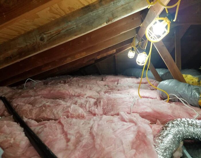 Attic Insulation Upgrade: Pink thermal insulation